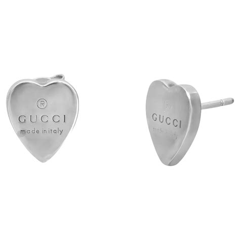 gucci sterling silver trademark heart earrings|gucci interlocking g silver earrings.